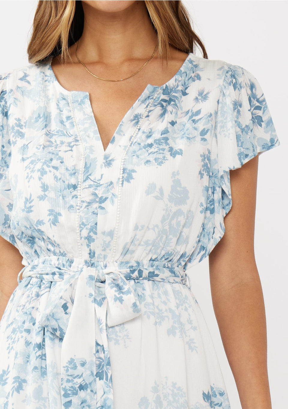 blue white floral belted dress neckline