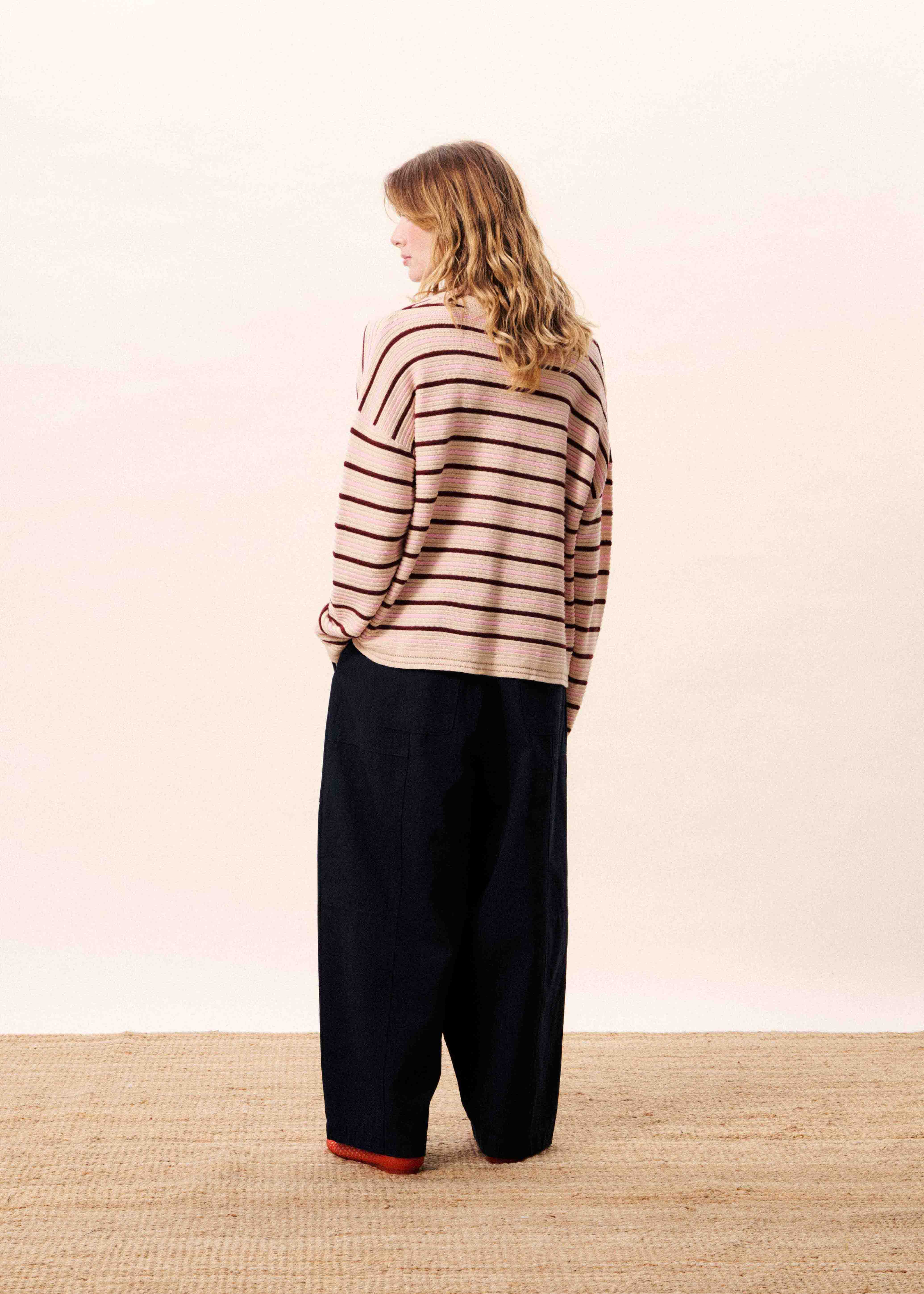drop sleeve pink and beige striped sweater