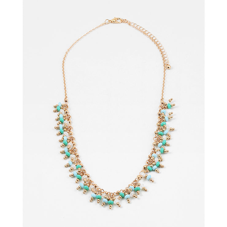 gold turquoise white beaded necklace