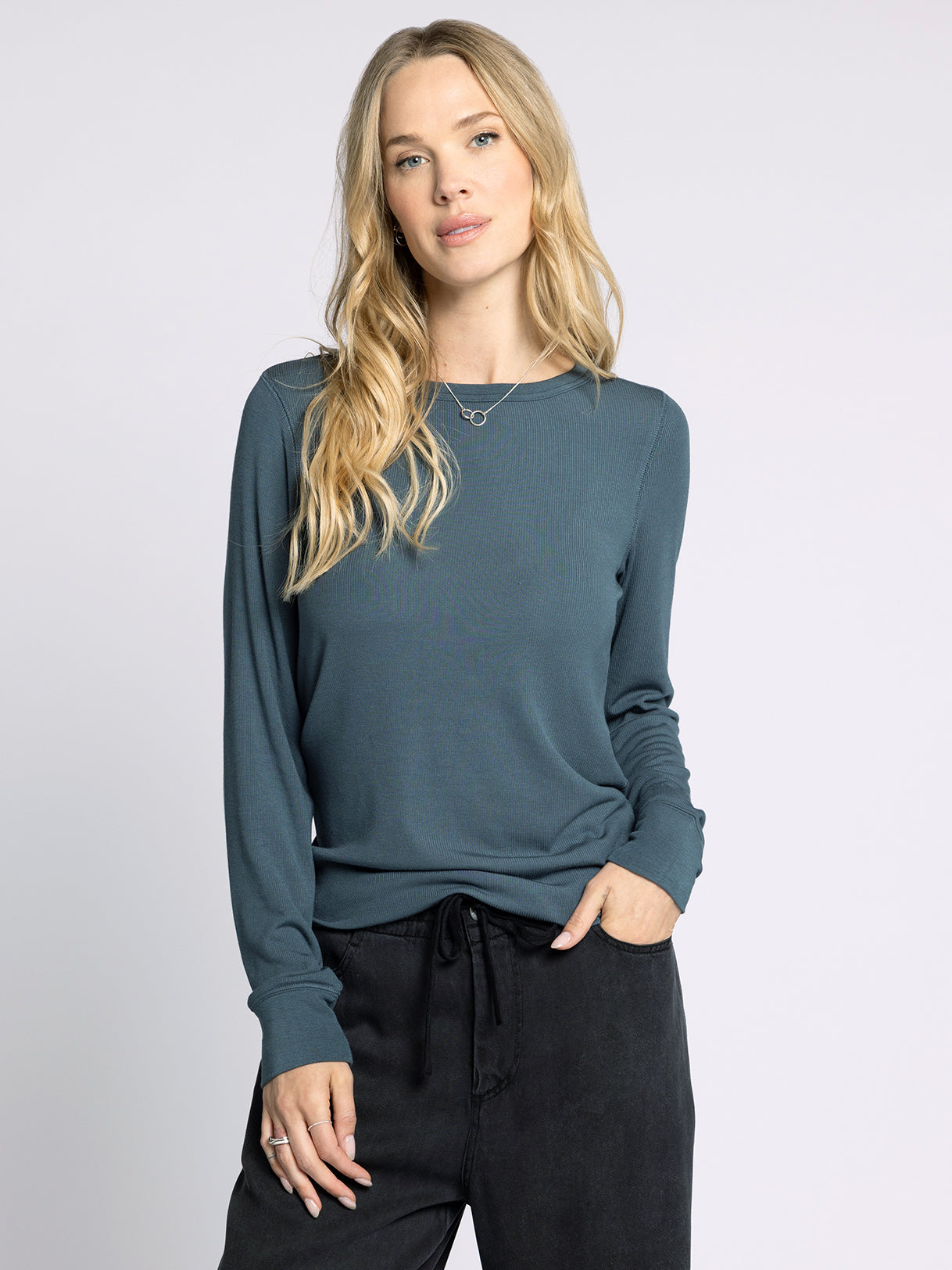 relaxed fit long sleeve top in a blue green