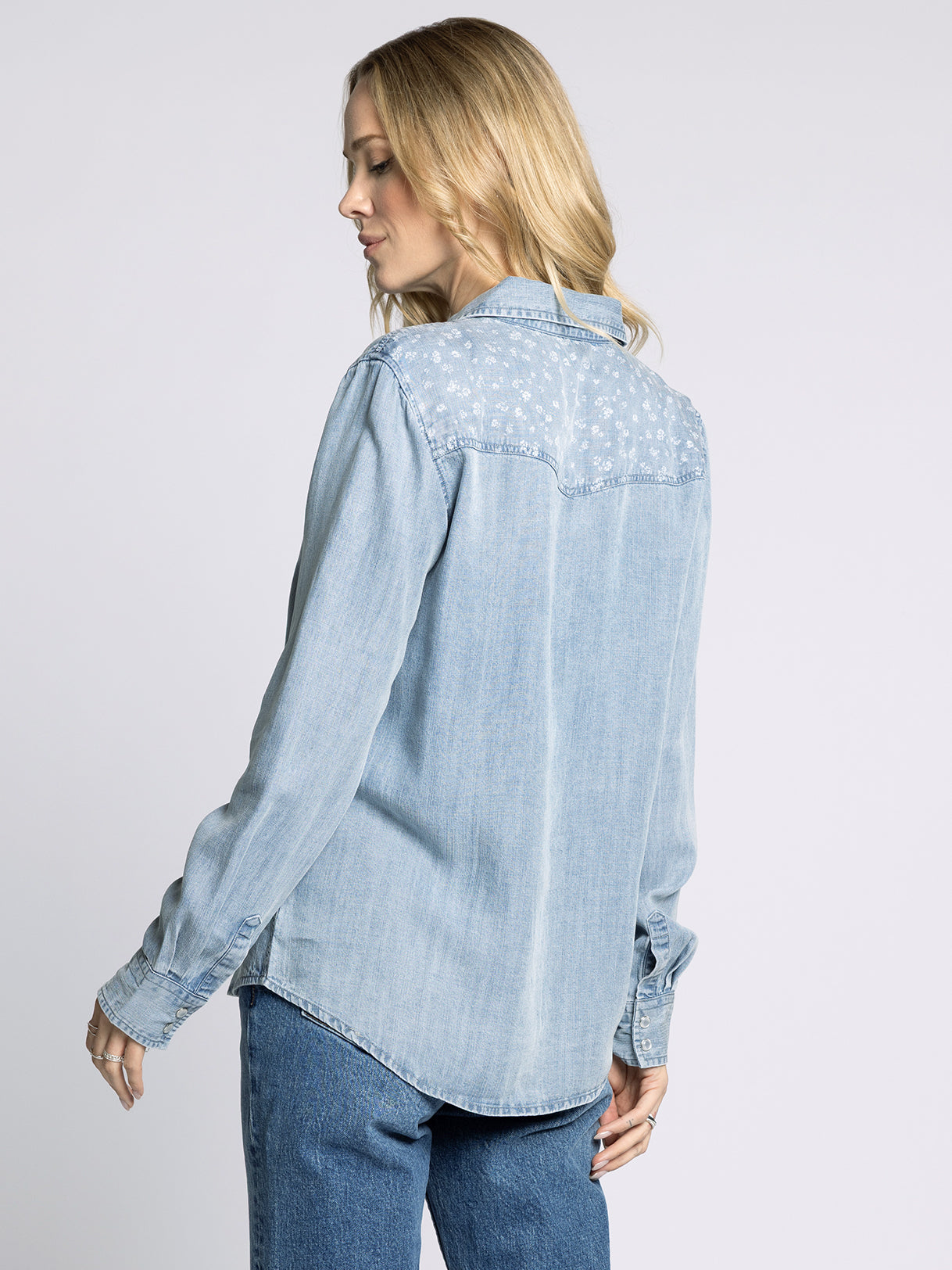 womens lightweight denim top with floral details on the shoulder